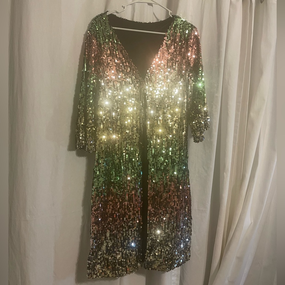 Multi color sequin Cardigan. Size Large. Would look good on a size M as well.